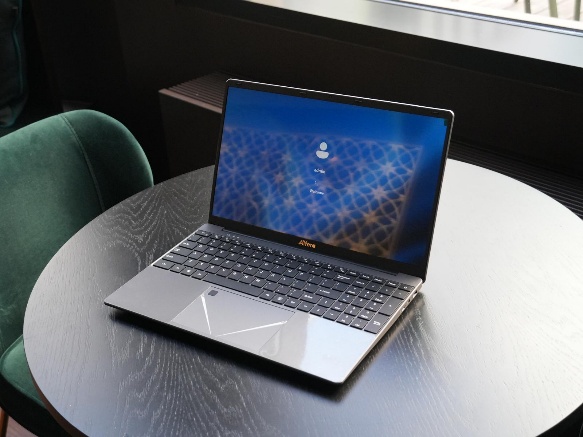 Alfera laptop powered on with display — Nigerian-designed laptop